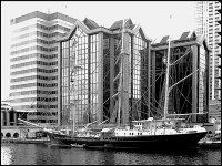 Sailing ship in front of Canary Wharf modern buildings FX55 1020041 mono.jpg