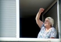 Woman watching Red Arrows from RAF Association Weston Super Mare DSC01663.JPG