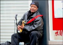 Busker with guitar Nottingham.jpg